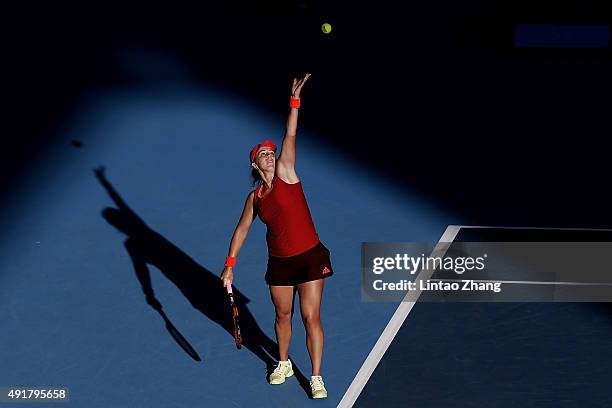 Anastasia Pavlyuchenkova of Russia serves to Flavia Penneta of Italy during the Women's singles Second round match on day six of the 2015 China Open...