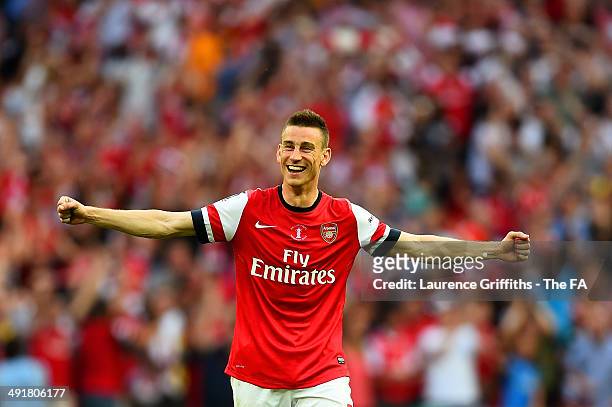 Laurent Koscielny of Arsenal celebrates victory after the FA Cup with Budweiser Final match between Arsenal and Hull City at Wembley Stadium on May...
