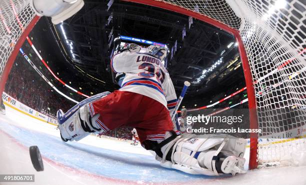 Lars Eller of the Montreal Canadiens scores a goal on goaltender Henrik Lundqvist of the New York Rangers in Game One of the Eastern Conference Final...