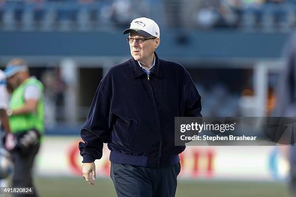 Seattle Seahawks owner Paul Allen walks across fthe field before a football game between the Detroit Lions and the Seattle Seahawks at CenturyLink...