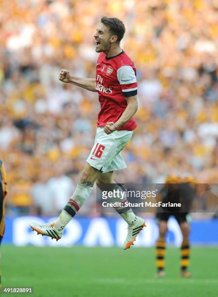 Arsenal's Aaron Ramsey celebrates at the final whistle after the FA Cup Final between Arsenal and Hull City at Wembley Stadium on May 17, 2014 in...
