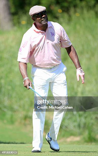 Celebrity golfer Dennis Haysbert reacts to his drive during the third round of the BMW Charity Pro-Am Presented by SYNNEX Corporation held at the...