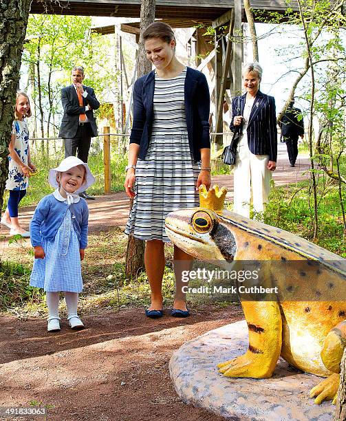Crown Princess Victoria of Sweden and Princess Estelle of Sweden open a Fairytale Path at Lake Takern on May 17, 2014 in Mjolby, Sweden.
