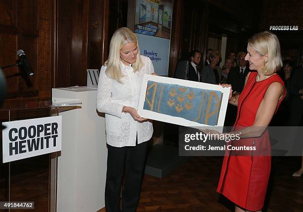 Crown Princess Mette-Marit of Norway presents a Norwegin textile that was orginally donated to the United Nations to Director of the Cooper Hewitt,...