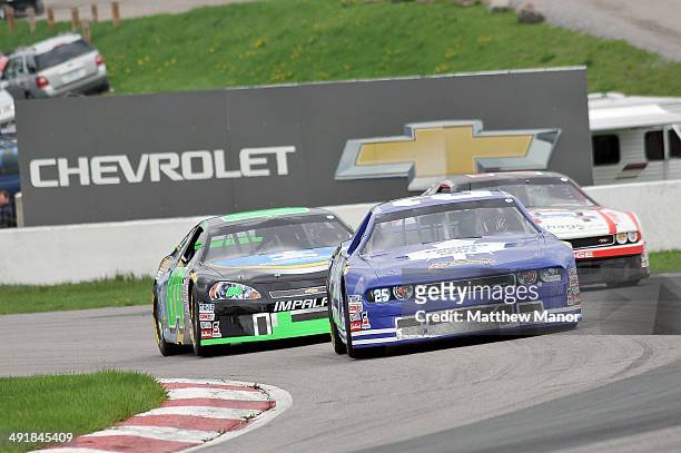 Joey McColm, driver of the PartSource/Toronto Maple Leafs Dodge drives through turn 3 during the practice session of the NASCAR Canadian Tire Series...