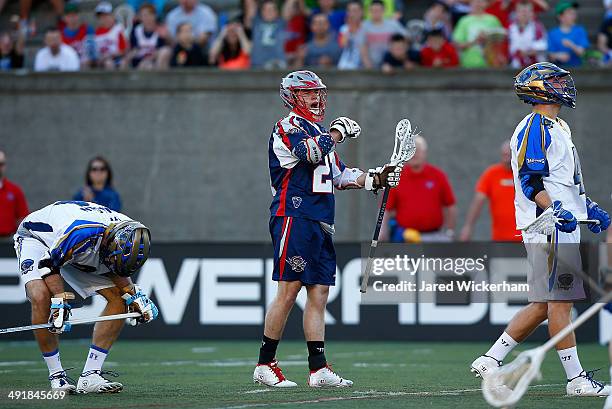 Kevin Buchanan of the Boston Cannons celebrates a goal in the first half against the Charlotte Hounds during the game at Harvard Stadium on May 17,...