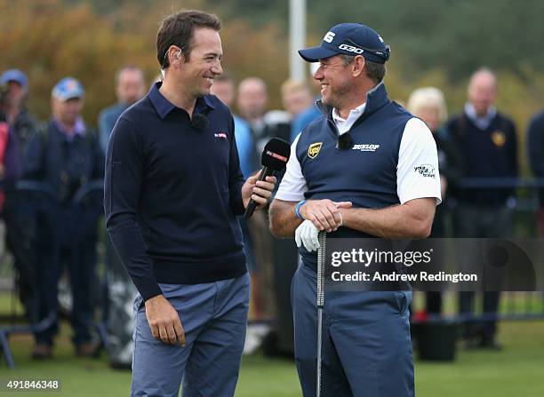 Nick Dougherty and Lee Westwood of England chat together during a Live Sky Sports Masterclass following the first round of the British Masters...