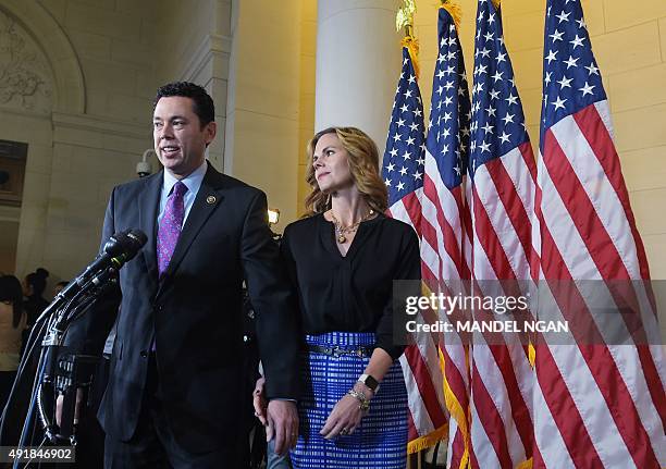 Rep. Jason Chaffetz, R-UT, with wife Julie at his side, arrives to speak to the media following the Republican nomination election for House speaker...