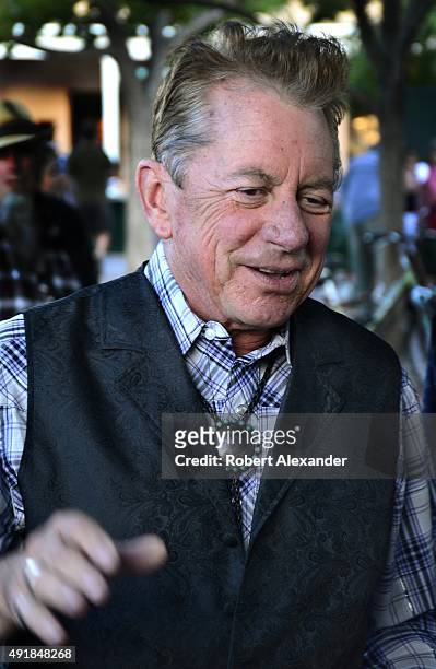 Americana and country rock singer/songwriter Joe Ely prepares to perform in a concert in Santa Fe, New Mexico.