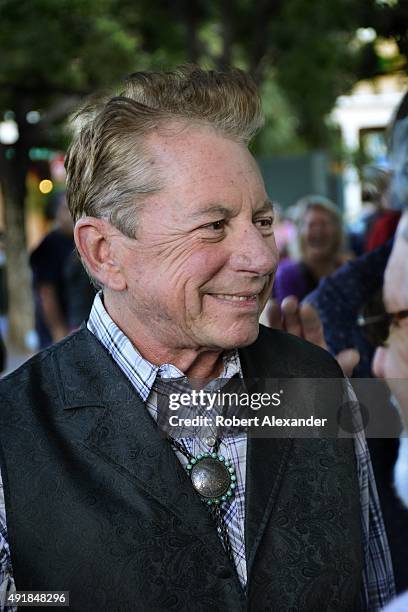 Americana and country rock singer/songwriter Joe Ely prepares to perform in a concert in Santa Fe, New Mexico.