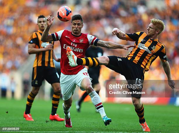 Olivier Giroud of Arsenal battles with Paul McShane of Hull City during the FA Cup with Budweiser Final match between Arsenal and Hull City at...