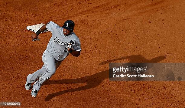 Dayan Viciedo of the Chicago White Sox runs to third base in the eighth iinning of their game against the Houston Astros at Minute Maid Park on May...