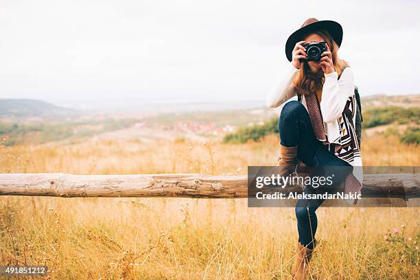 hiker girl with a camera - girl camera bildbanksfoton och bilder