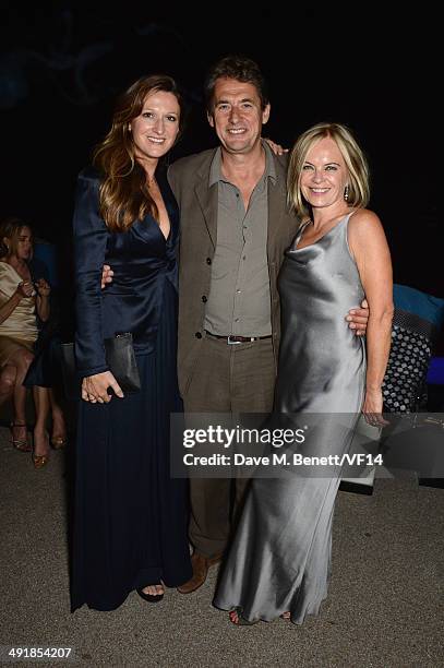 Amy Gadney and Tim Bevan attend the Vanity Fair And Armani Party at the 67th Annual Cannes Film Festival on May 17, 2014 in Cap d'Antibes, France.