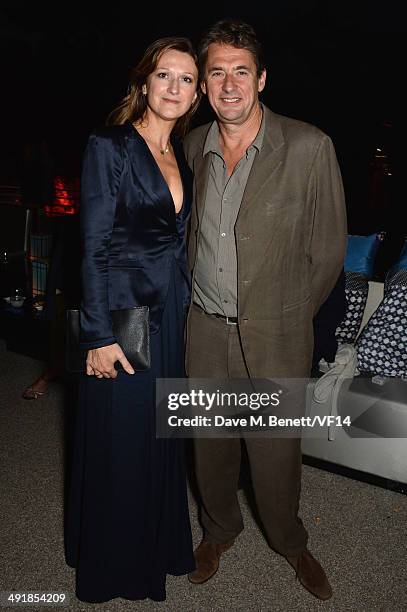 Amy Gadney and Tim Bevan attend the Vanity Fair And Armani Party at the 67th Annual Cannes Film Festival on May 17, 2014 in Cap d'Antibes, France.