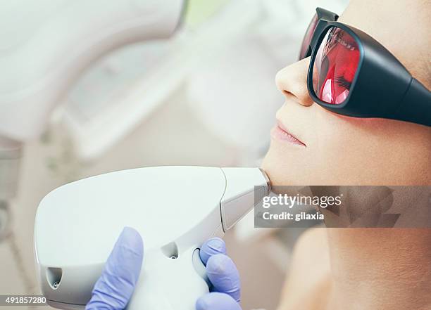 laser hair removal. - electrolysis stock pictures, royalty-free photos & images