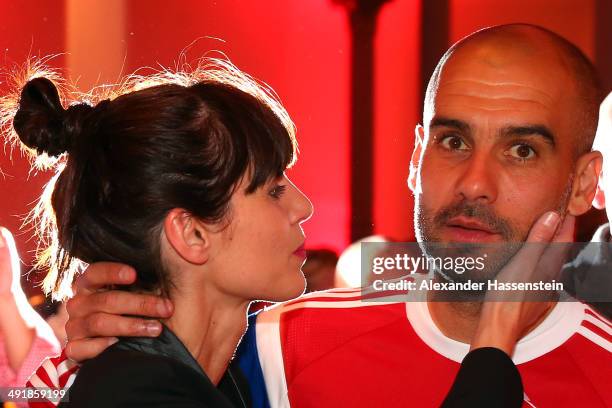 Josep Guardiola, head coach of Bayern Muenchen and his wife Cristina Serra during the FC Bayern Muenchen Champions party after winning the German DFB...