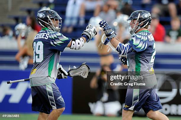 Brendan Mundorf of the Chesapeake Bayhawks celebrates with Matt Mackrides after scoring in the first quarter against the Florida Launch at...