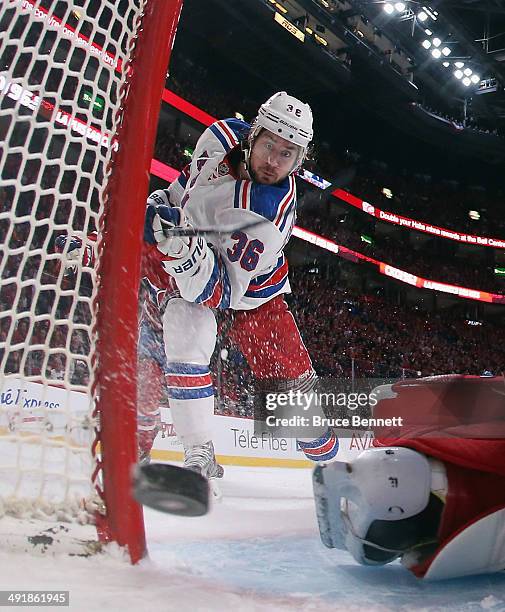 Mats Zuccarello of the New York Rangers scores at 6:27 of the first period against the Montreal Canadiens in Game One of the Eastern Conference Final...