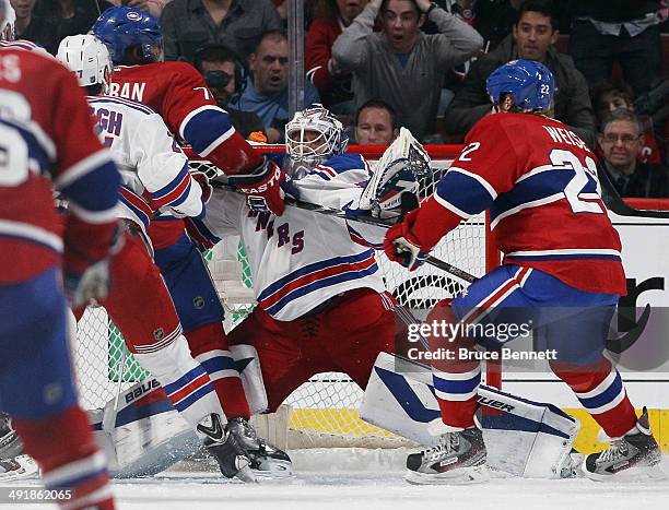 Subban of the Montreal Canadiens bumps into Henrik Lundqvist of the New York Rangers in Game One of the Eastern Conference Final during the 2014...