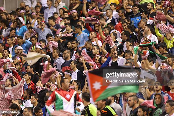 Jordanian fans support their national football team during the 2018 FIFA World Cup qualification match between Jordan and Australia Socceroos at...