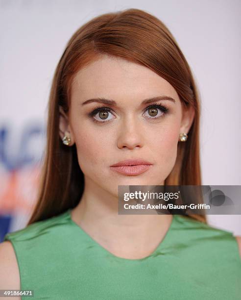 Actress Holland Roden arrives at the 21st Annual Race To Erase MS Gala at the Hyatt Regency Century Plaza on May 2, 2014 in Century City, California.