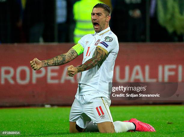 Aleksandar Kolarov of Serbia celebrates victory after the UEFA EURO 2016 qualifier between Albania and Serbia at the Elbasan Arena on October 08,...