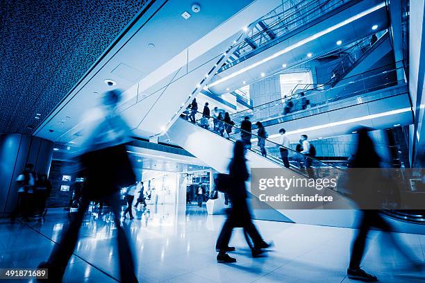 business people commuting  of hong kong - shopping centre escalator stock pictures, royalty-free photos & images