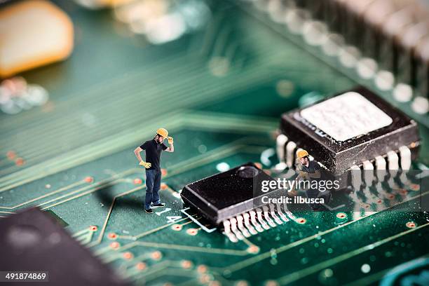 fixing computers - pcb board stock pictures, royalty-free photos & images