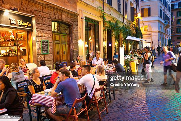 evening outdoor street restaurants night life of rome - rome italy stock pictures, royalty-free photos & images