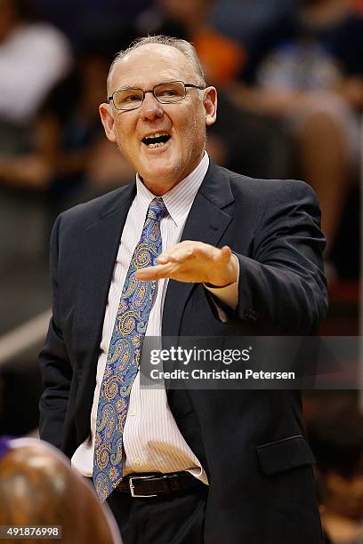 Head coach George Karl of the Sacramento Kings reacts during the second half of the preseason NBA game against the Phoenix Suns at Talking Stick...