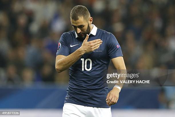 France's forward Karim Benzema reacts during the friendly football match between France and Armenia on October 8, 2015 at the Allianz Riviera stadium...