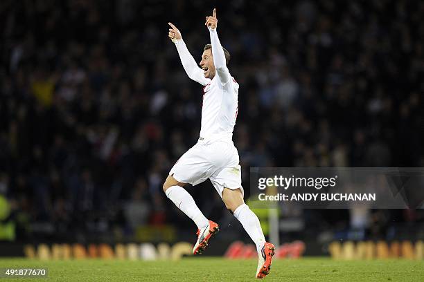 Poland's Grzegorz Krychowiak celebrates after his team's second goal to draw 2-2 at the end of the UEFA Euro 2016 qualifying Group D football match...
