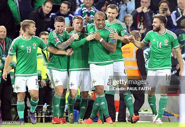 Northern Ireland's striker Josh Magennis celebrates after he scored during the UEFA Euro 2016 qualifying Group F football match between Northern...