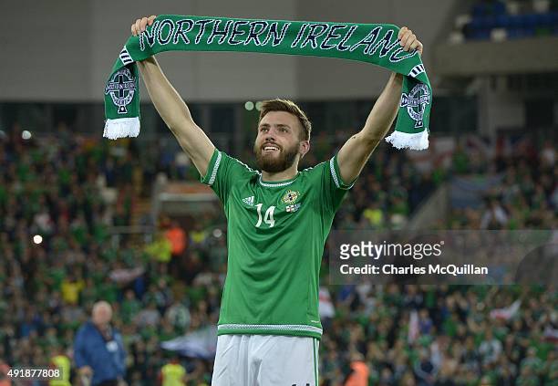 Stuart Dallas of Northern Ireland celebrates qualification after the UEFA EURO 2016 qualifier between Northern Ireland and Greece at Windsor Park on...
