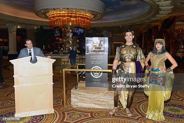 Roman characters Julius Caesar and Cleopatra appear as Caesars Palace General Manager Sean McBurney speaks during the grand prize presentation of the...