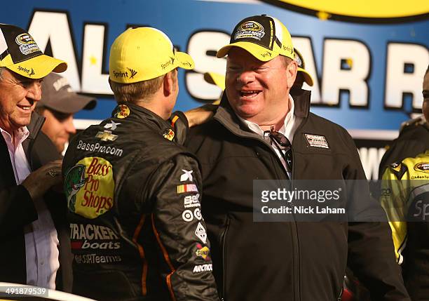 Chip Ganassi , owner of Chip Ganassi Racing, talks so Jamie McMurray, driver of the Bass Pro Chevrolet, in victory lane after the NASCAR Sprint Cup...