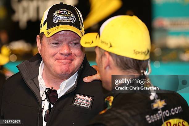 Chip Ganassi , owner of Chip Ganassi Racing, talks so Jamie McMurray, driver of the Bass Pro Chevrolet, in victory lane after the NASCAR Sprint Cup...