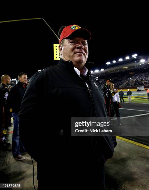 Chip Ganassi, owner of Chip Ganassi Racing, stands in the pits after the NASCAR Sprint Cup Series Sprint All-Star Race at Charlotte Motor Speedway on...