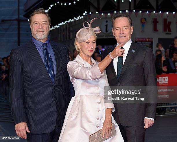 John Goodman, Dame Helen Mirren and Bryan Cranston attend a screening of "Trumbo" during the BFI London Film Festival at Odeon Leicester Square on...