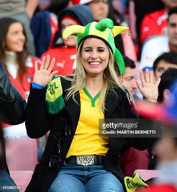 Fans of Brazil cheer for their team before the start of the Russia 2018 FIFA World Cup qualifiers match Chile vs Brazil, at the Nacional stadium in...