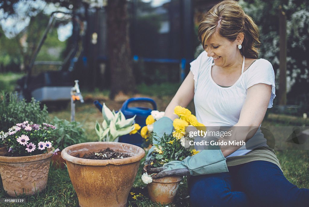 Pregnant mother gardening.