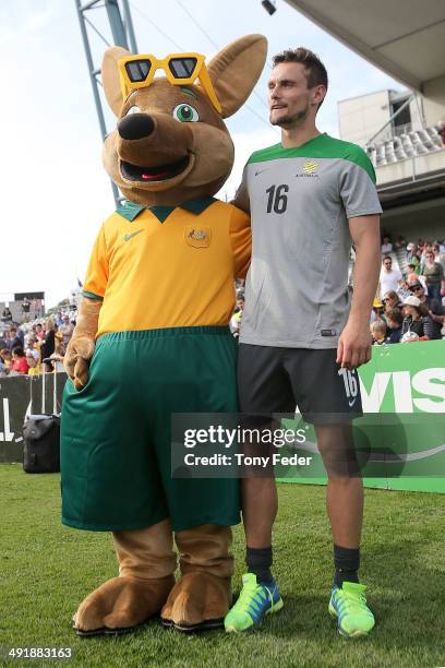 Maloo the Socceroos mascot poses with James Holland of the Socceroos during the Australian Socceroos Fan Day & Training Session at Bluetongue Stadium...