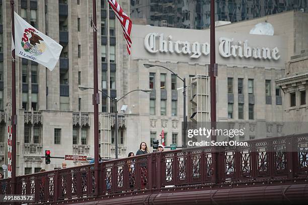 The Tribune Tower, home of the Chicago Tribune sits along Michigan Avenue at the Chicago River on October 8, 2015 in Chicago, Illinois. Tribune Media...