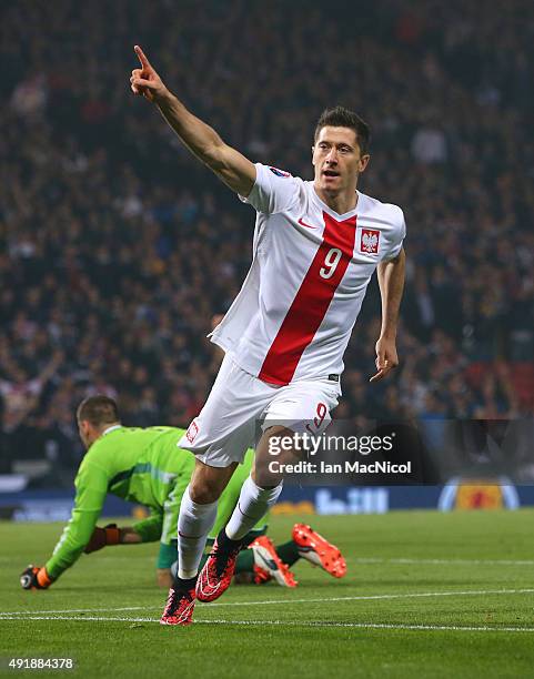 Robert Lewandowski of Poland celebrates after he scores during the UEFA EURO 2016 qualifier between Scotland and Poland at Hampden Park on October...