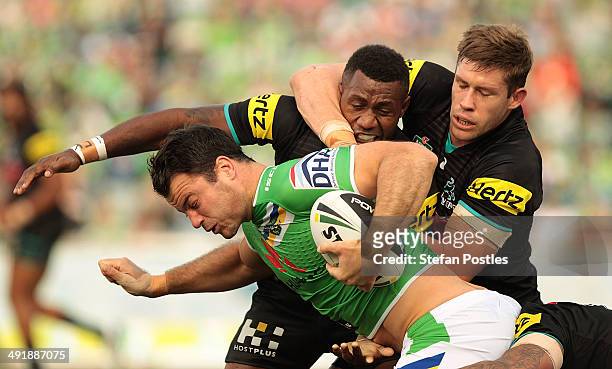 David Shillington of the Raiders is tackled during the round 10 NRL match between the Canberra Raiders and the Penrith Panthers at GIO Stadium on May...