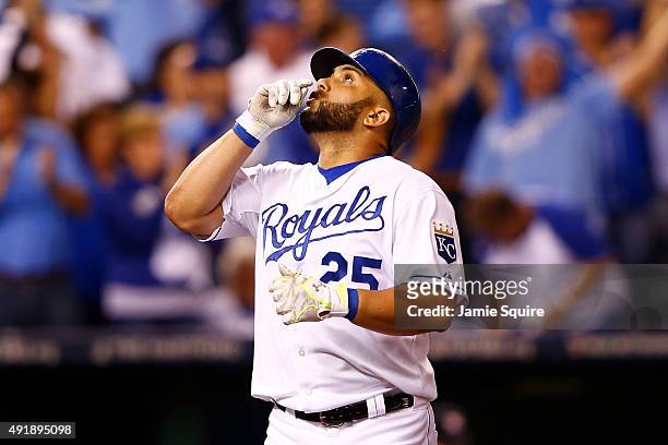 Kendrys Morales of the Kansas City Royals celebrates after hitting a solo home run in the second inning against the Houston Astros during game one of...