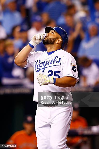 Kendrys Morales of the Kansas City Royals celebrates after hitting a solo home run in the second inning against the Houston Astros during game one of...