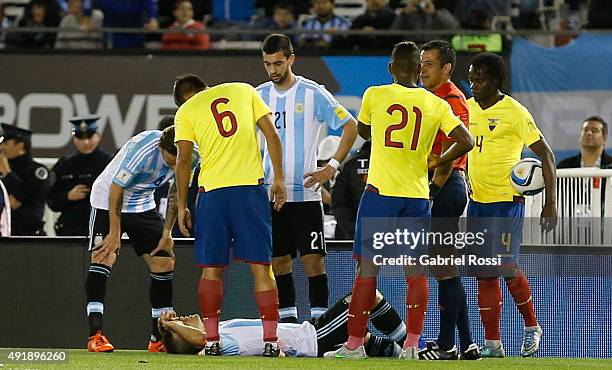 Sergio Aguero, of Argentina, grimaces in pain after being injured during a match between Argentina and Ecuador as part of FIFA 2018 World Cup...