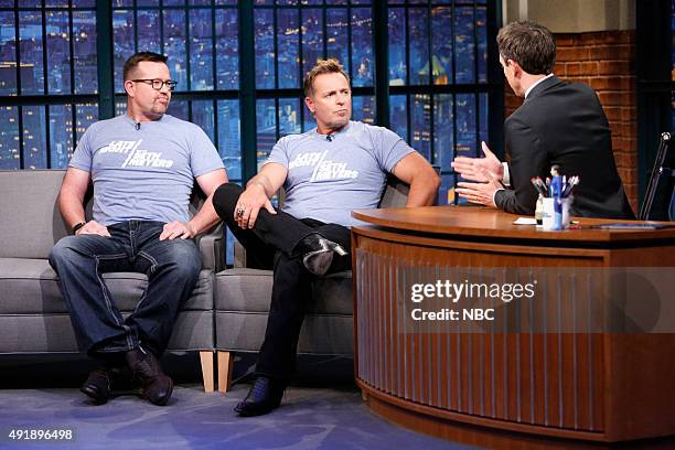 Episode 272 -- Pictured: Baseball analyst, Sean Casey and Kevin Millar, during an interview with host Seth Meyers on October 8, 2015 --